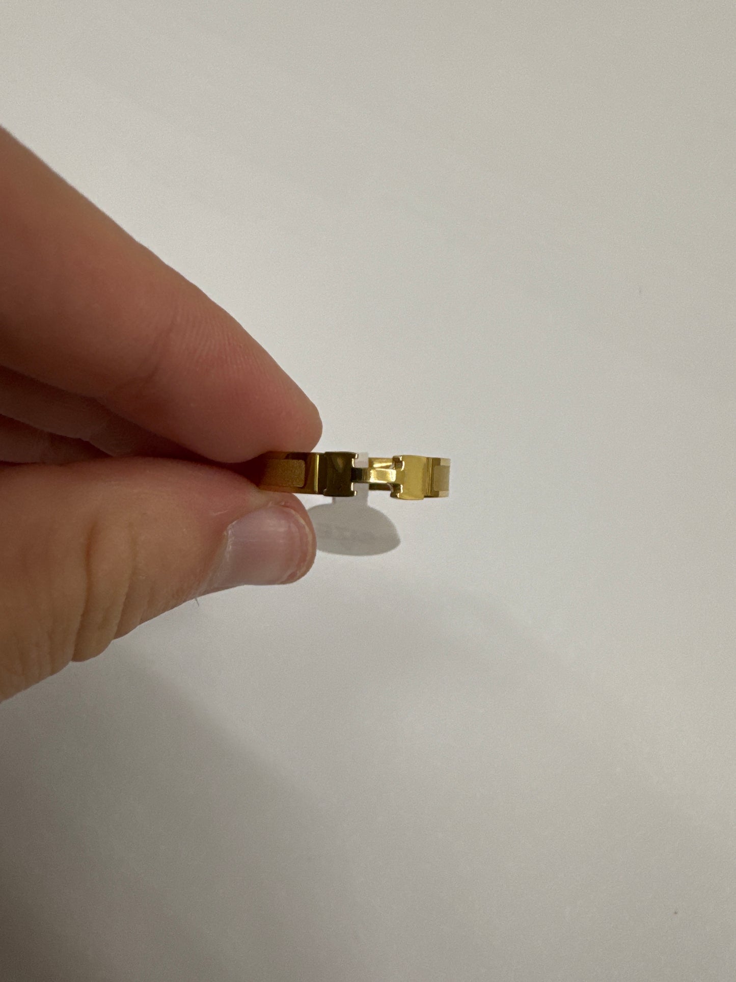 Gold H ring