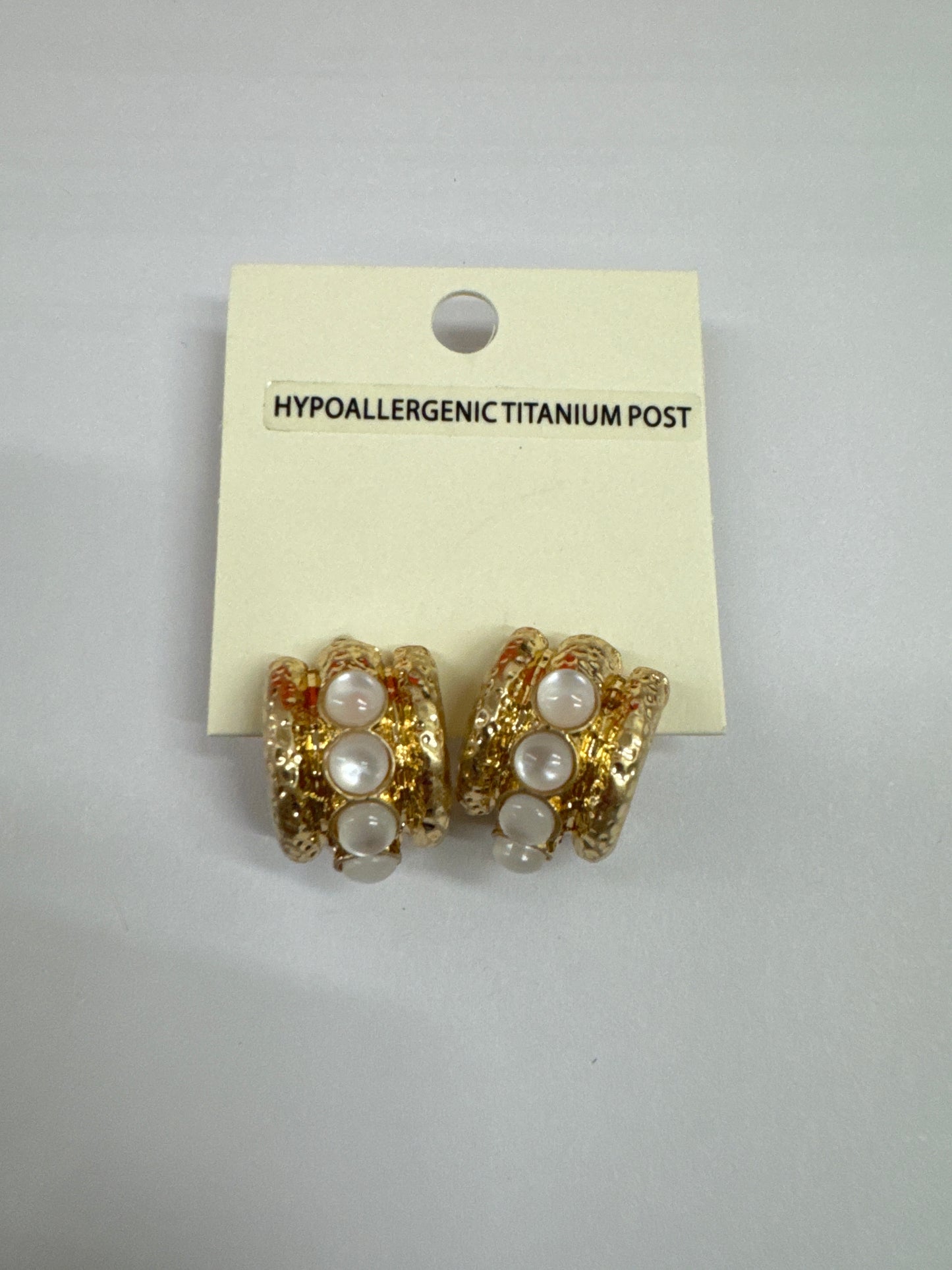Gold and pearl earrings