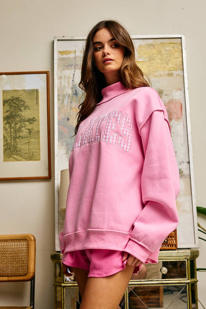 IT2594E-PILATES2  Embroidered "PILATES" Mock Neck Sweatshirt